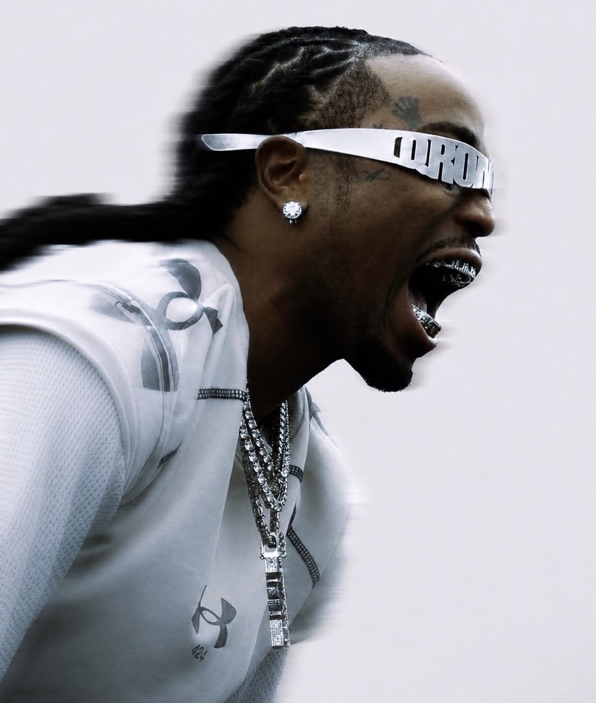 Quavo in profile wearing QRÖMELIFE chrome eyewear
