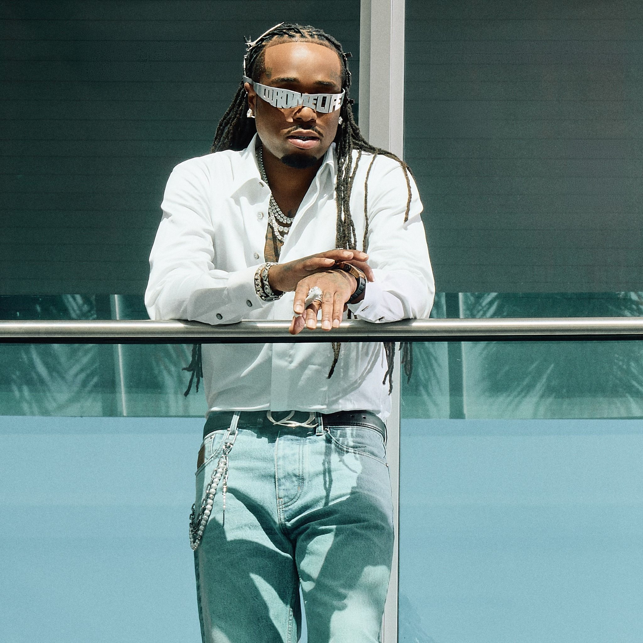 Quavo in QRÖMELIFE eyewear and a white shirt